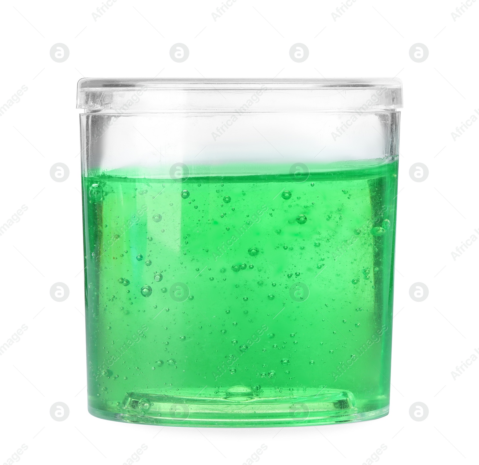 Photo of Green slime in plastic container isolated on white. Antistress toy
