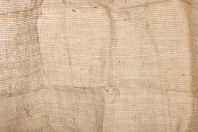 Texture of natural burlap fabric as background, closeup