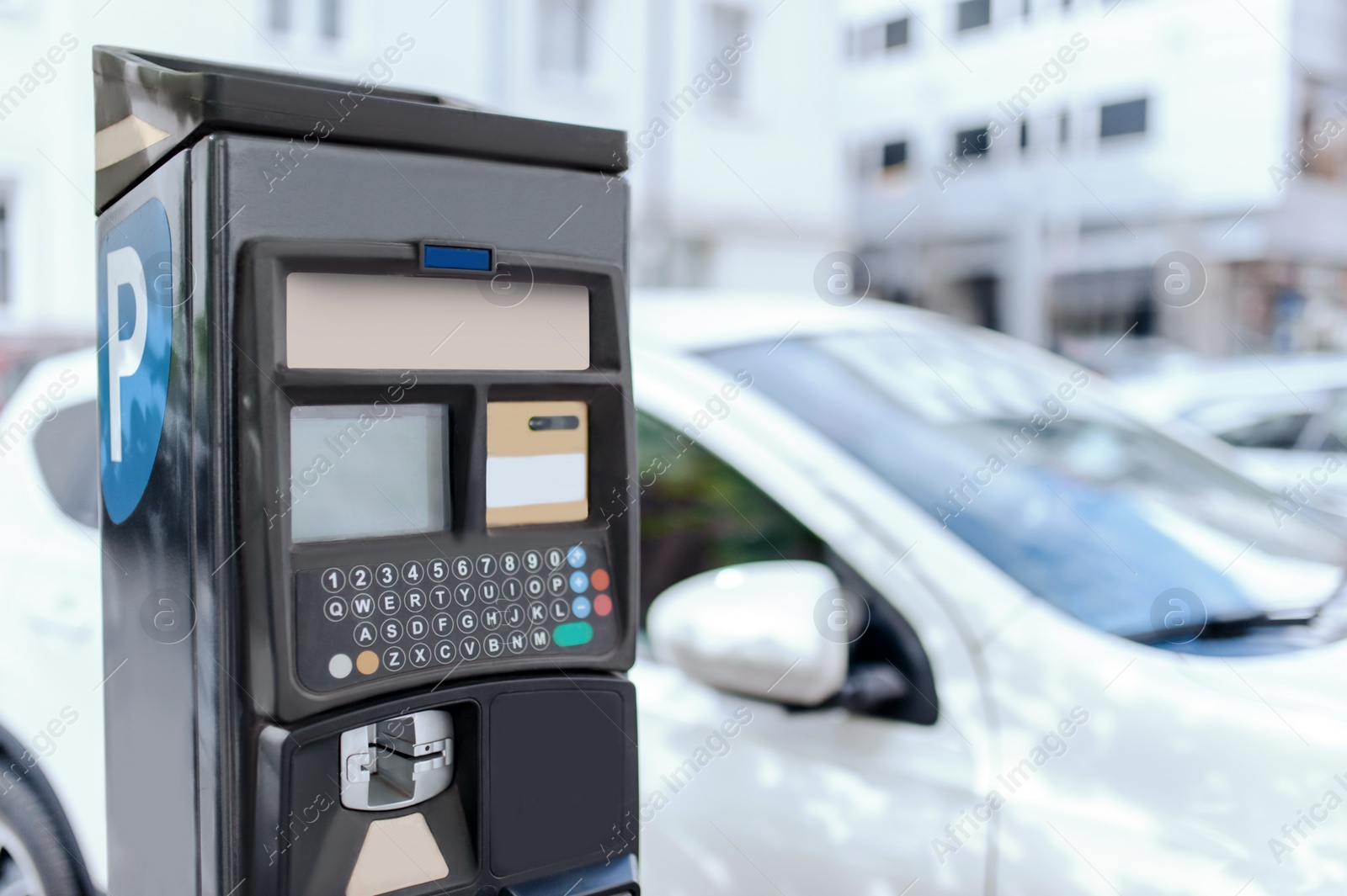 Photo of Modern parking meter on city street, closeup. Space for text