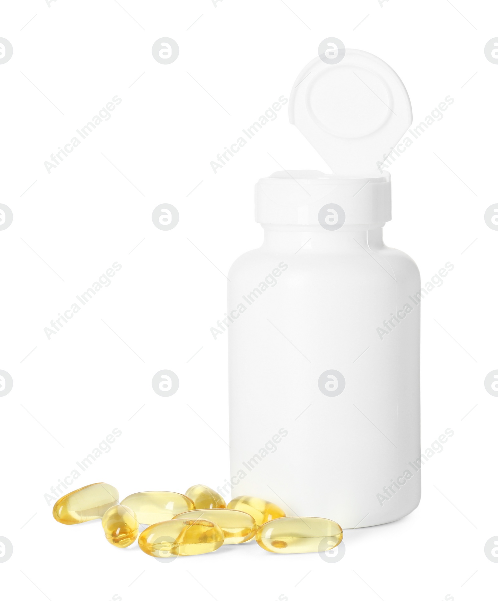 Photo of Bottle and pile of softgel capsules isolated on white