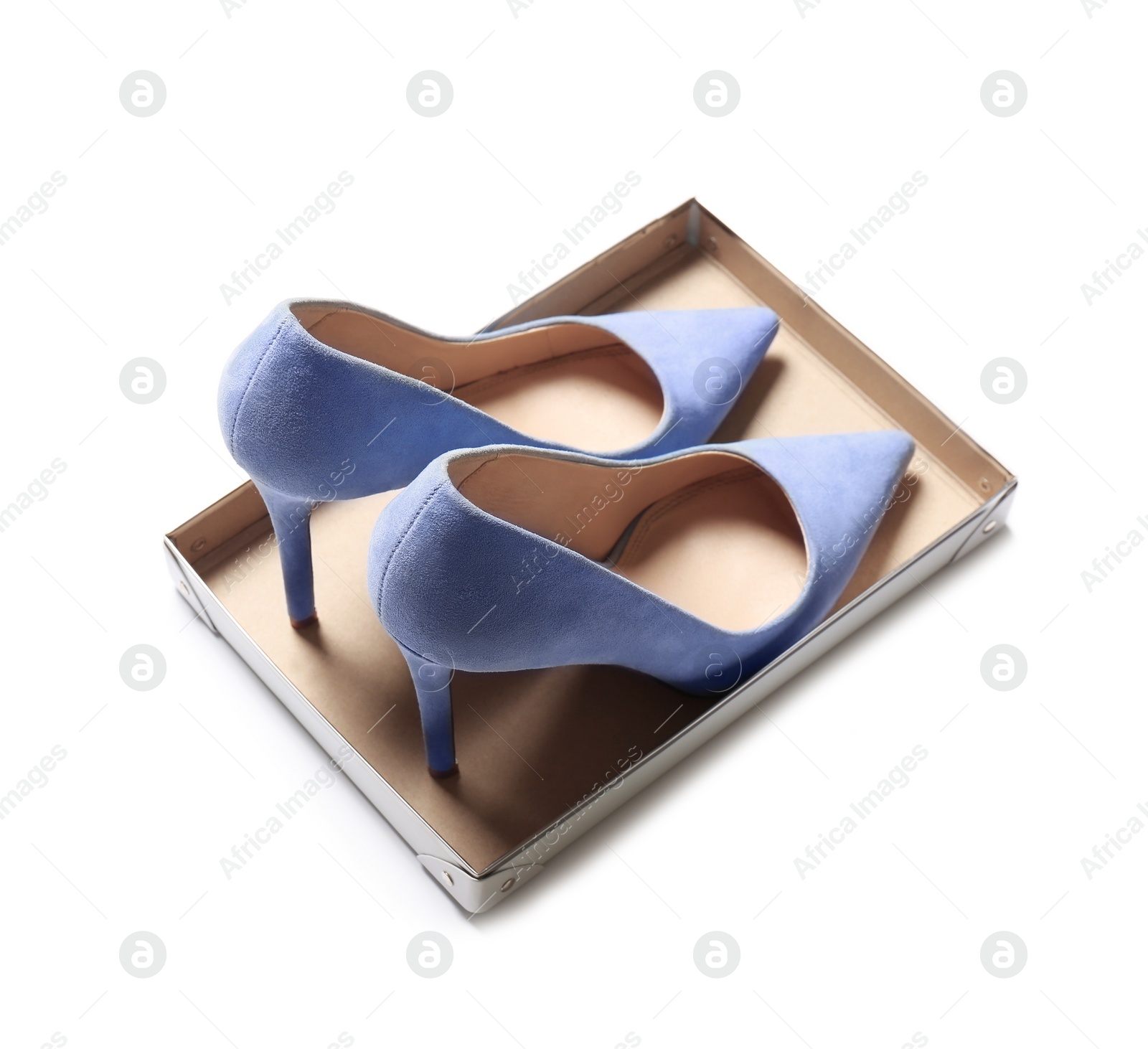 Photo of Pair of lady's shoes on light background