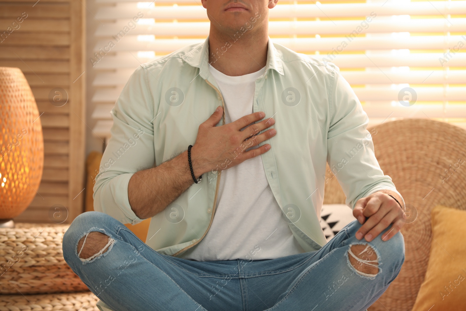 Photo of Man during self-healing session in therapy room, closeup