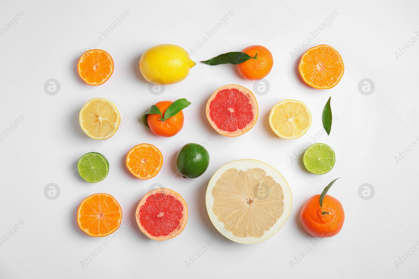 Photo of Different citrus fruits on white background, flat lay