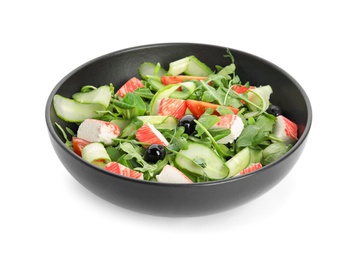 Photo of Delicious crab stick salad in black bowl isolated on white