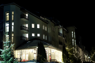 Beautiful modern hotel at night. Winter vacation