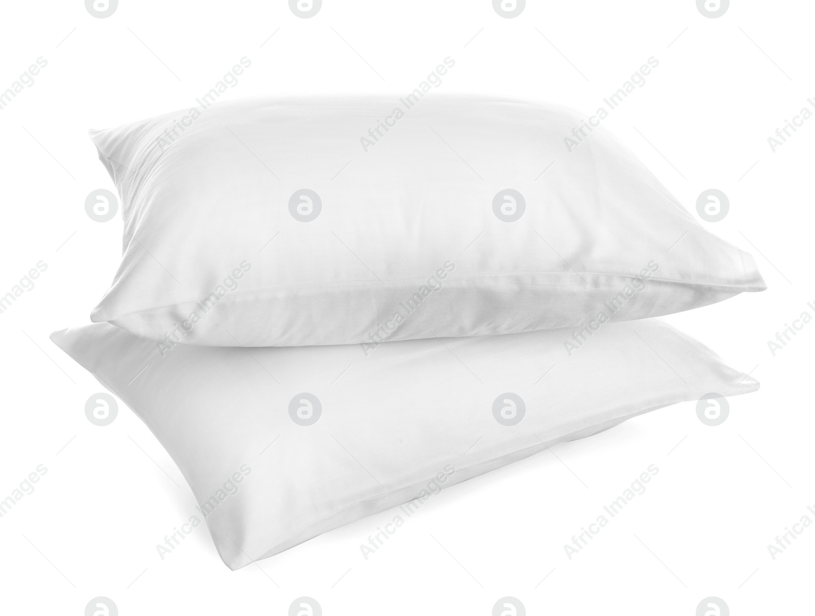 Photo of Clean soft bed pillows on white background