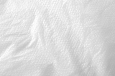 Photo of Texture of white plastic bag as background, closeup