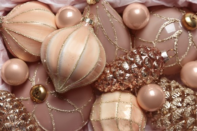 Photo of Many beautiful Christmas tree baubles as background, closeup