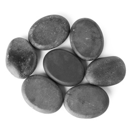 Photo of Black spa stones on white background, top view