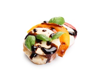 Photo of Delicious bruschetta with mozzarella cheese, tomatoes and balsamic vinegar isolated on white