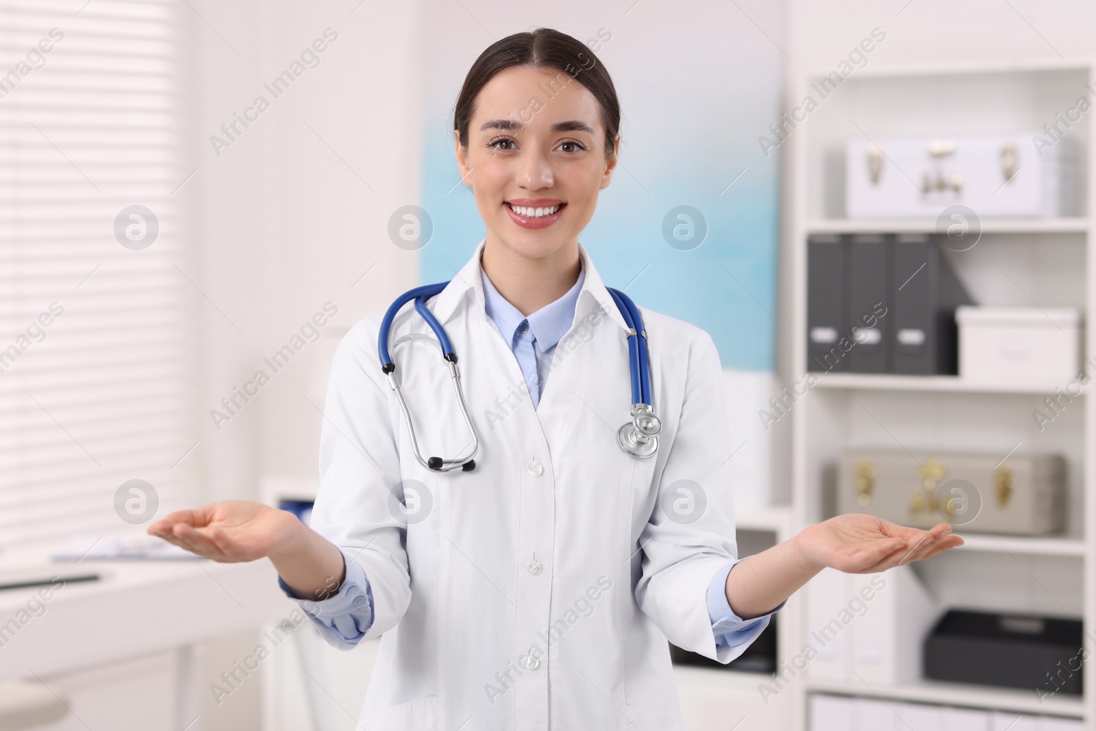 Photo of Portrait of medical consultant with stethoscope in clinic