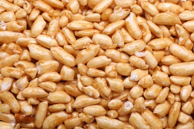 Photo of Puffed rice bar (kozinaki) as background, top view