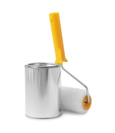 Can of paint and roller on white background