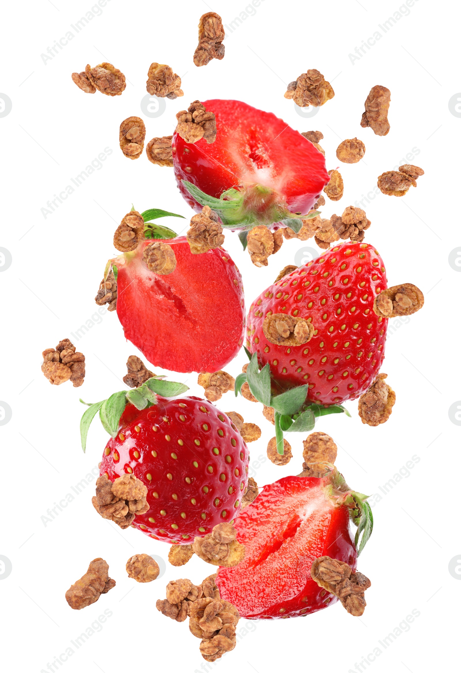 Image of Delicious granola and strawberries falling on white background. Healthy snack  