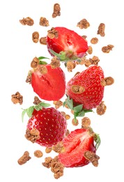 Delicious granola and strawberries falling on white background. Healthy snack  