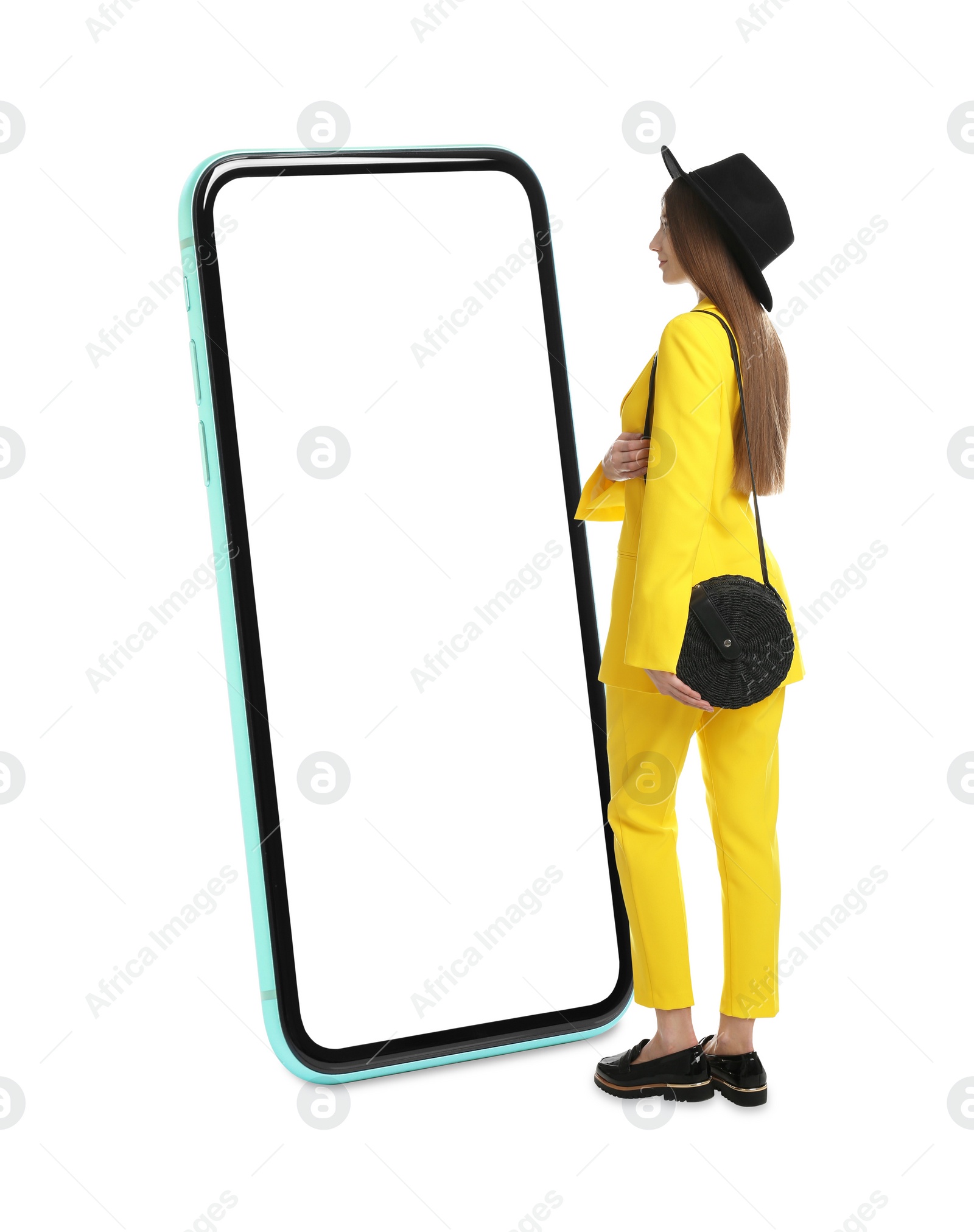 Image of Woman standing in front of big smartphone on white background