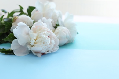 Photo of Bouquet of beautiful flowers on table, closeup