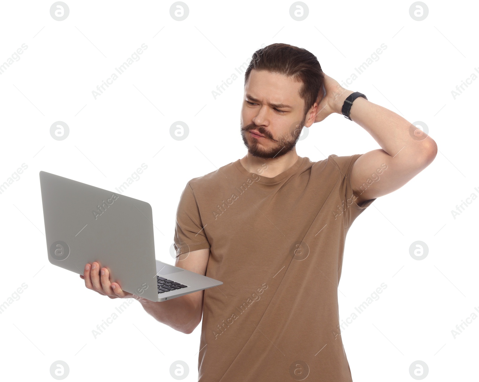 Photo of Pensive man using laptop on white background