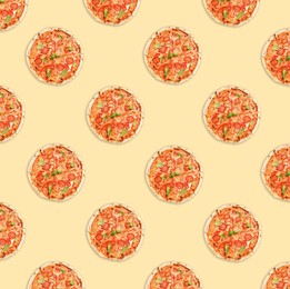 Image of Many delicious Margherita pizzas on beige background, flat lay. Seamless pattern design