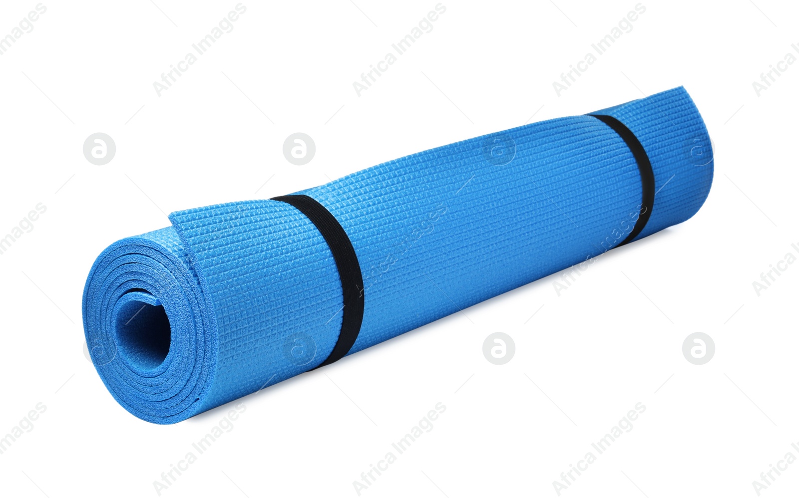 Photo of Rolled light blue camping mat isolated on white