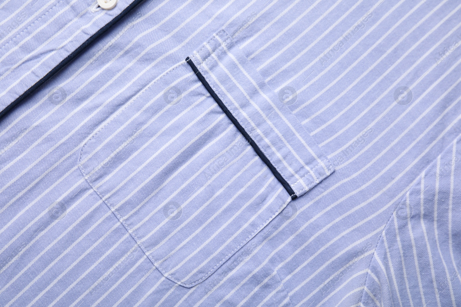 Photo of Striped shirt with pocket as background, top view