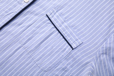 Photo of Striped shirt with pocket as background, top view