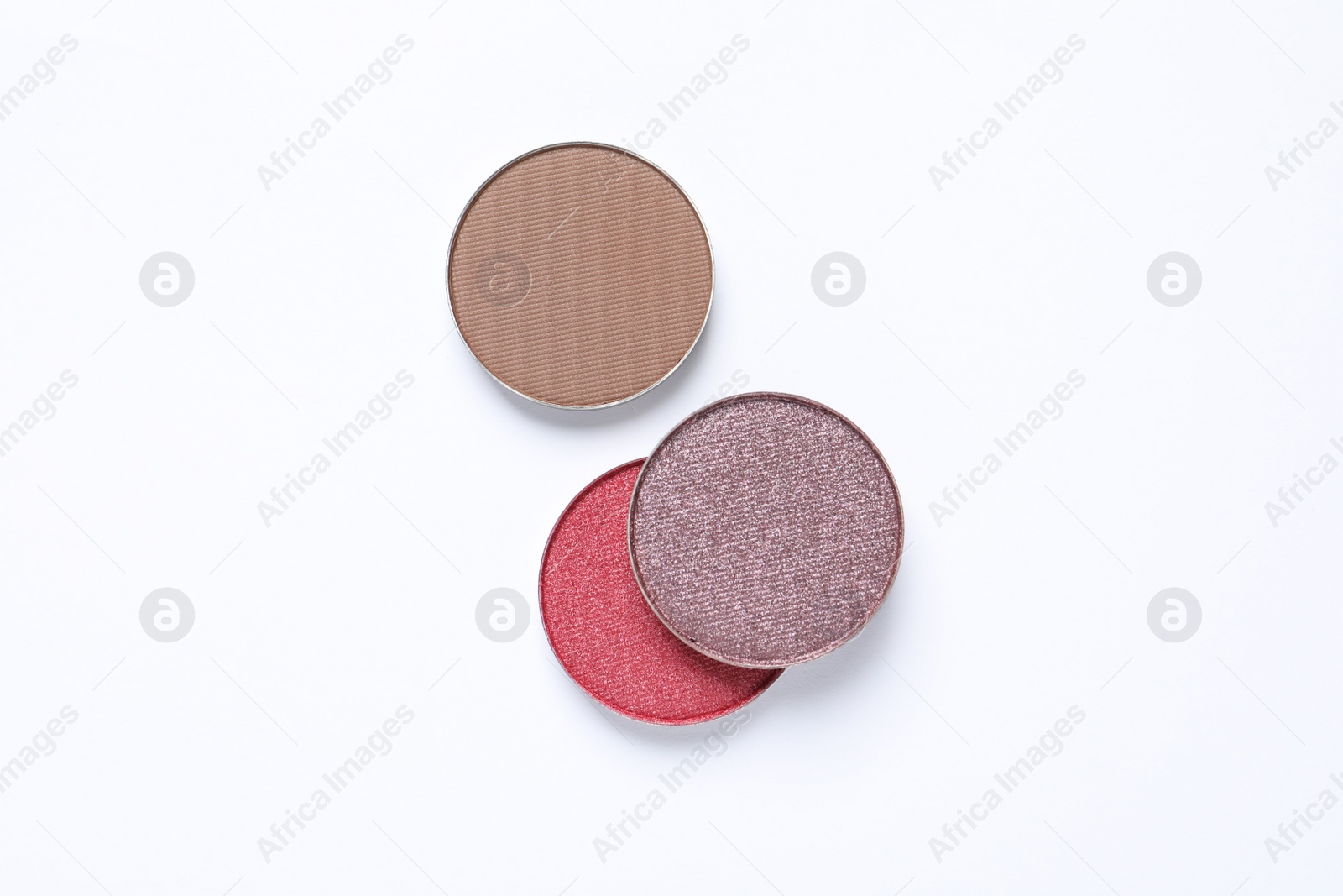 Photo of Different beautiful eye shadows on white background, flat lay