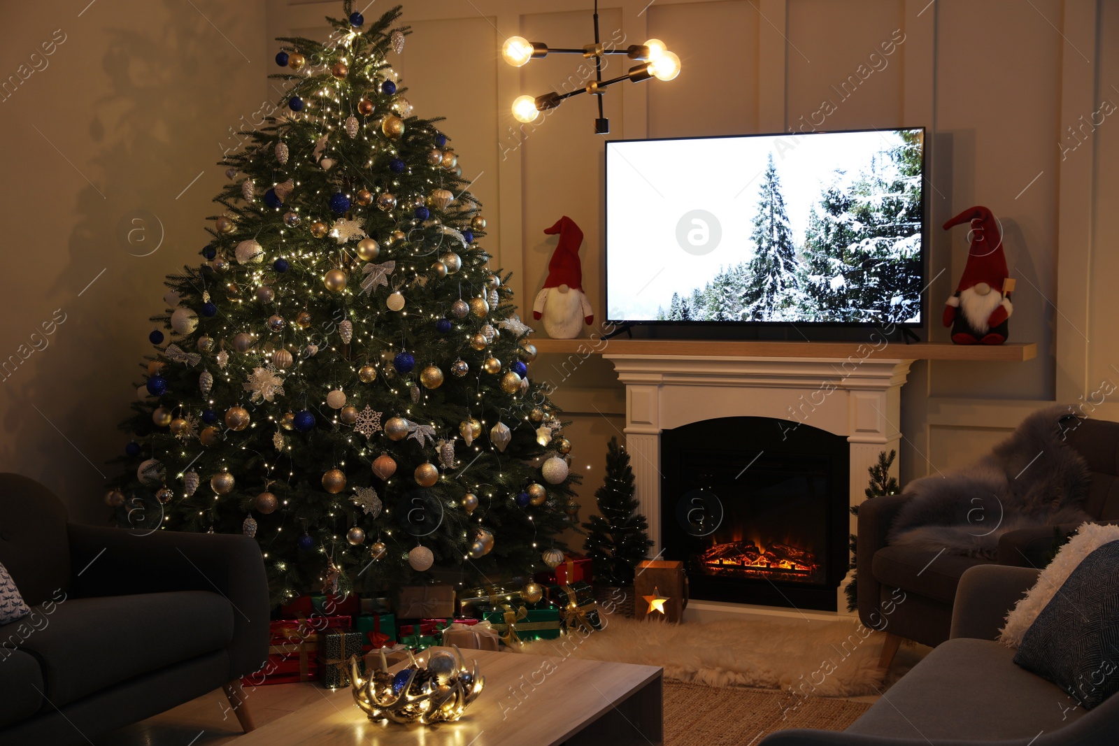 Photo of Cozy living room interior with beautiful Christmas tree near fireplace