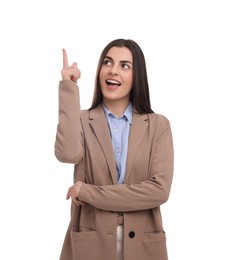 Photo of Beautiful businesswoman pointing at something on white background
