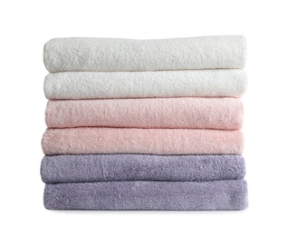 Photo of Stack of fresh towels isolated on white