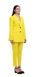 Photo of Beautiful businesswoman in yellow suit on white background