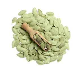 Wooden scoop and pumpkin seeds isolated on white, top view