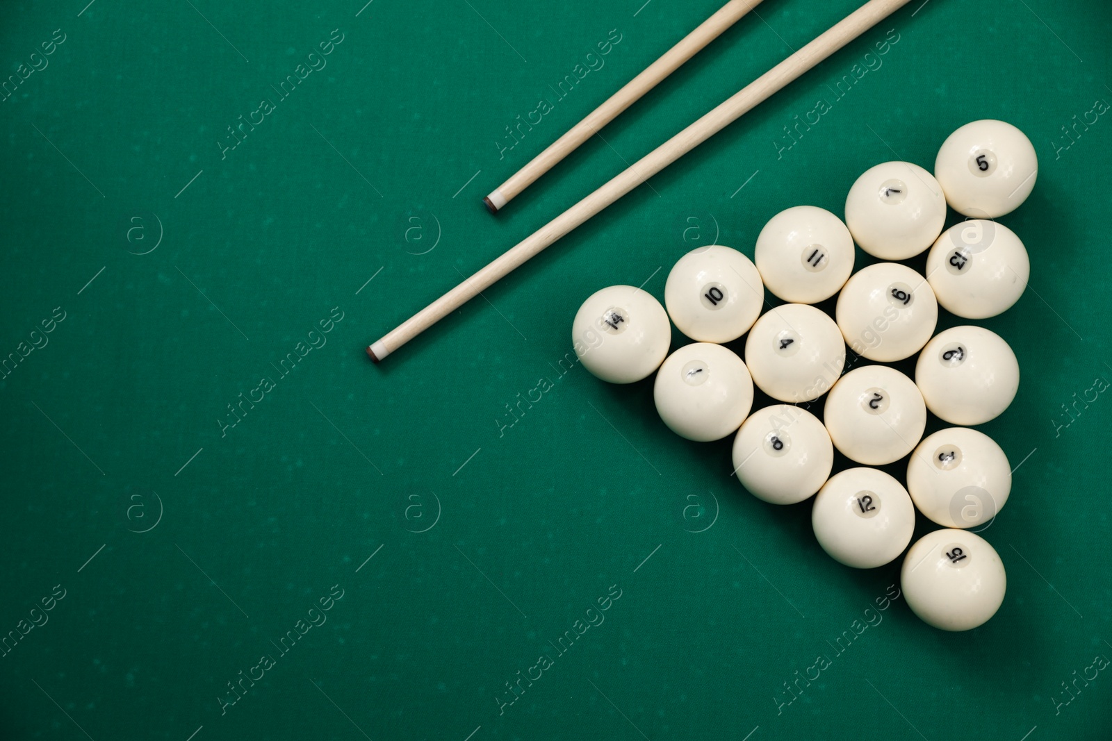 Photo of Flat lay composition with balls on billiard table. Space for text