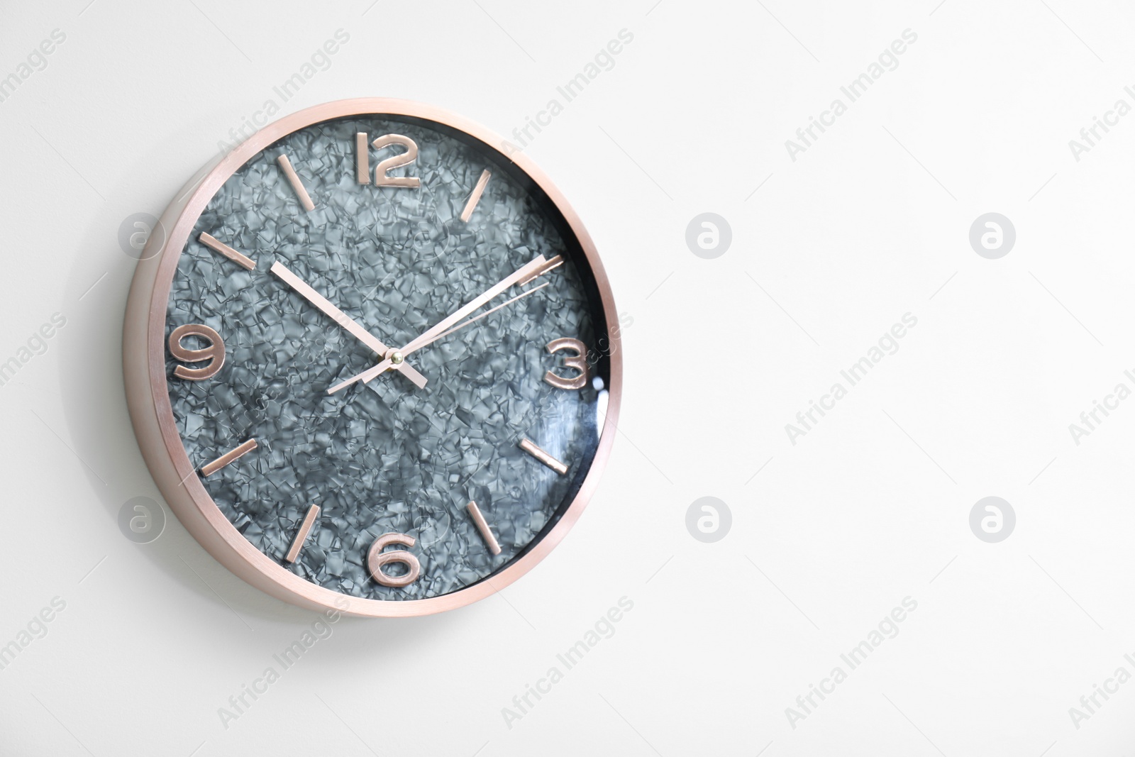 Photo of Stylish clock on white background. Time concept