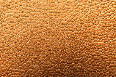 Image of Golden textured surface as background, closeup view