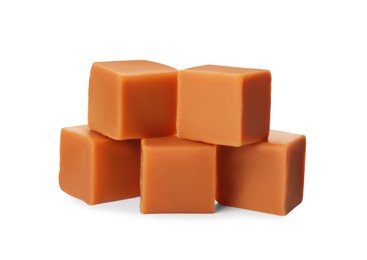 Photo of Heap of caramel candies on white background