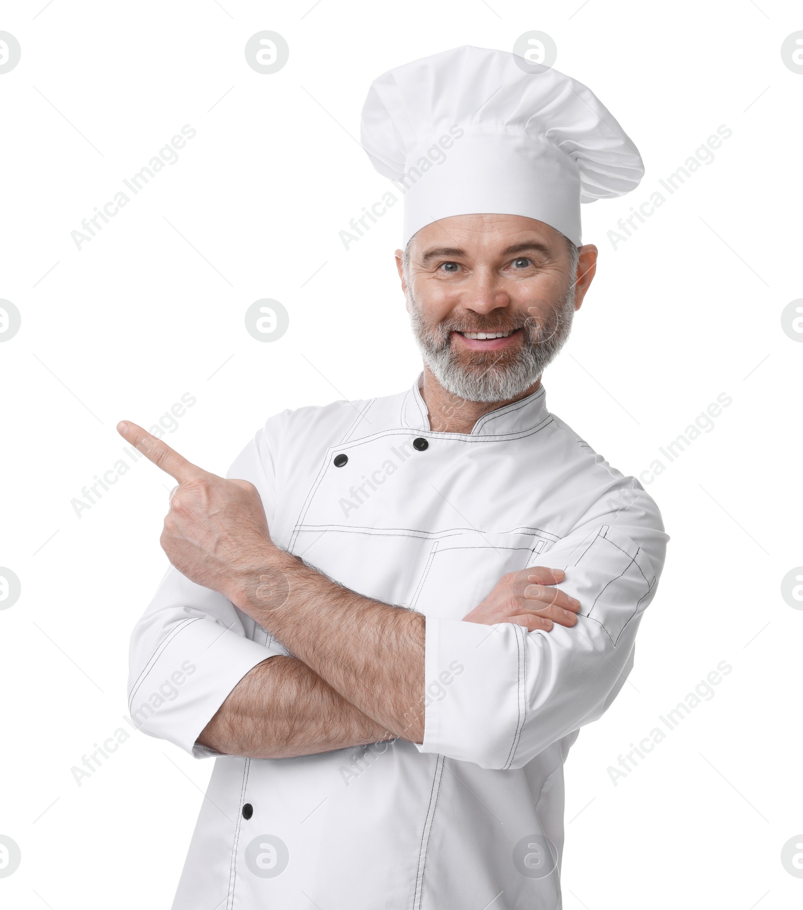 Photo of Happy chef in uniform pointing at something on white background