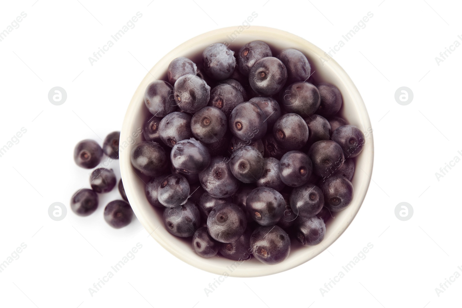 Photo of Bowl with fresh acai berries on white background