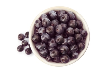 Photo of Bowl with fresh acai berries on white background