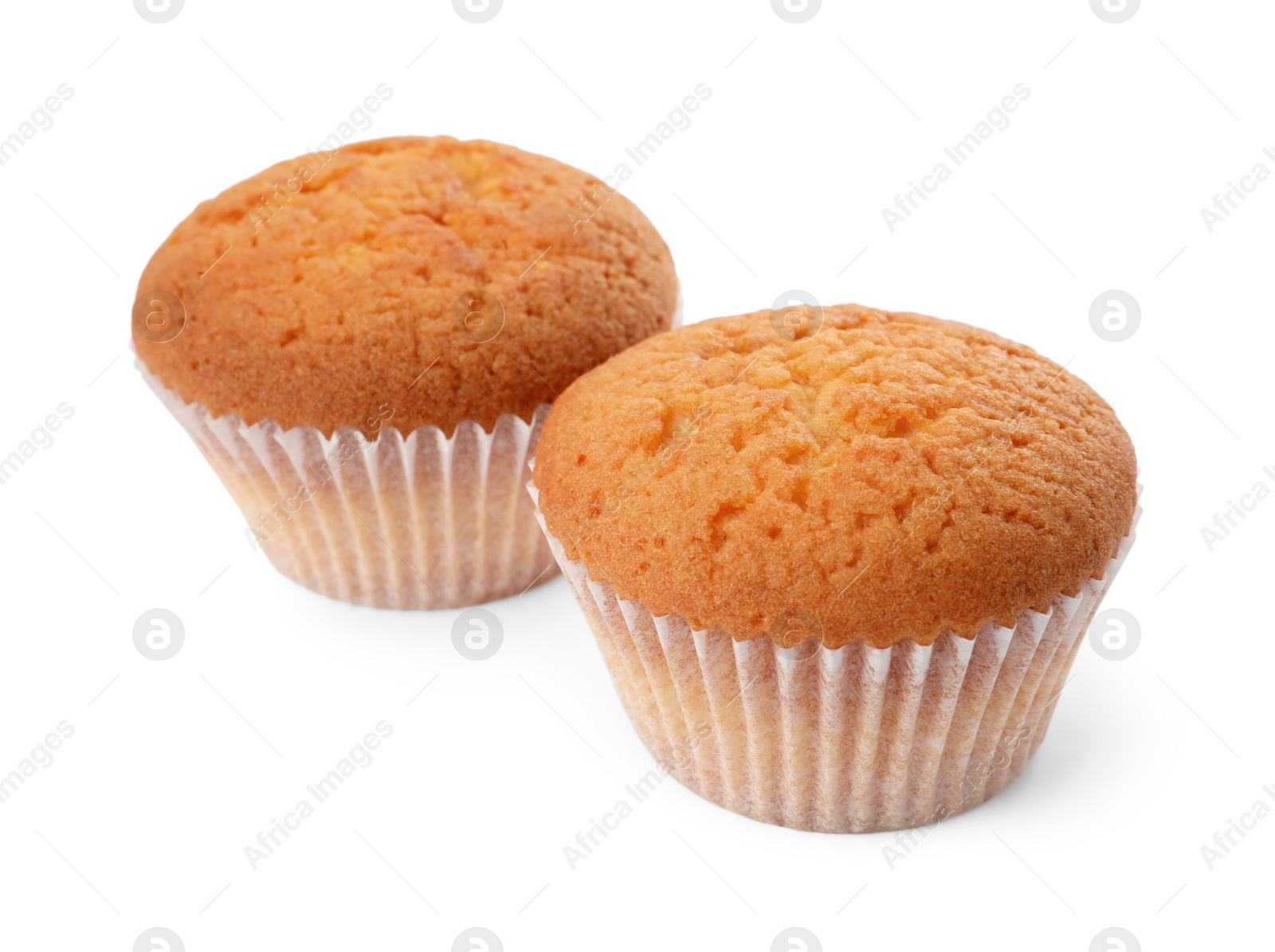 Photo of Tasty muffins isolated on white. Fresh pastries