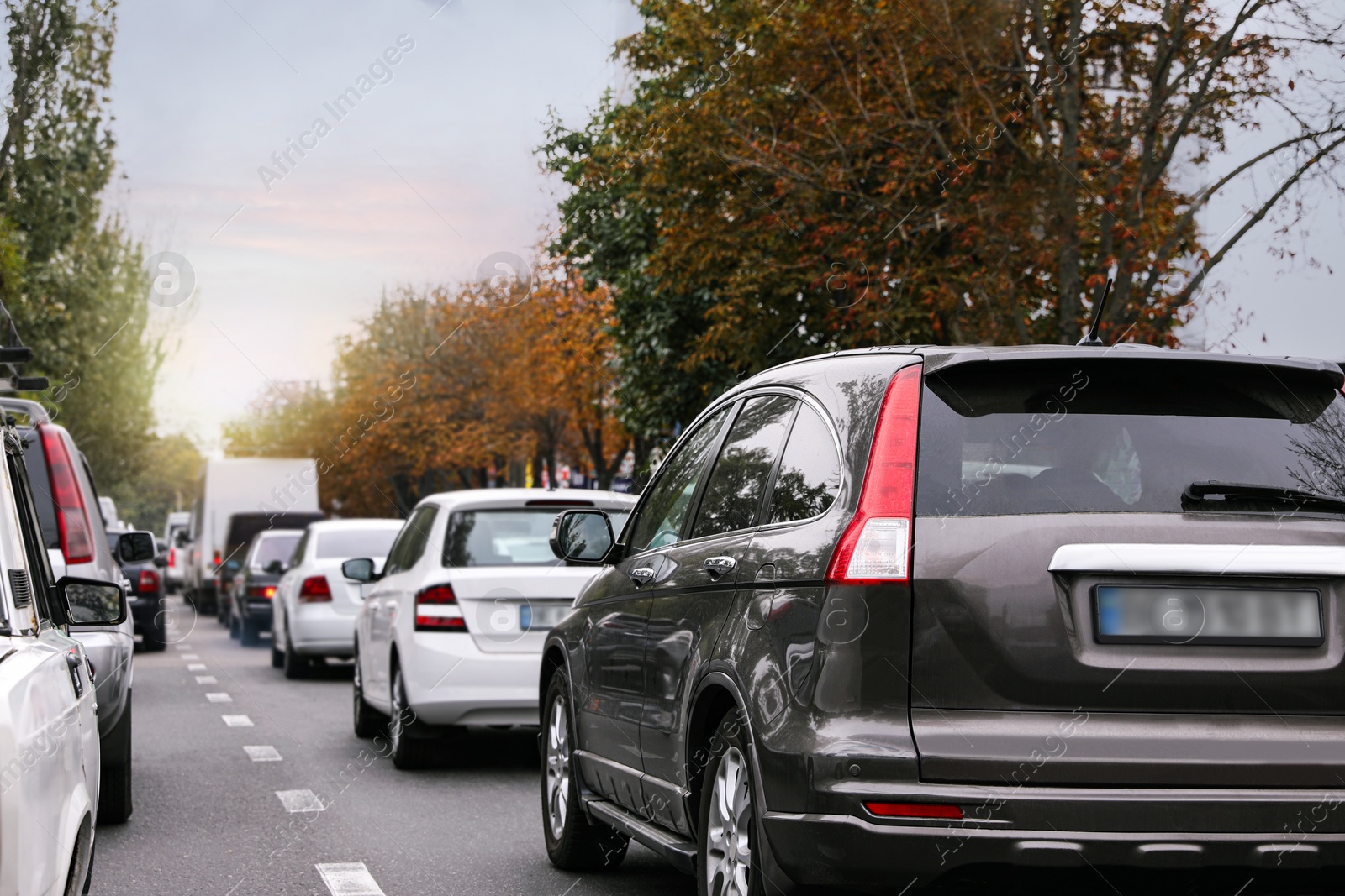 Image of Heavy traffic jam on city street at rush hour