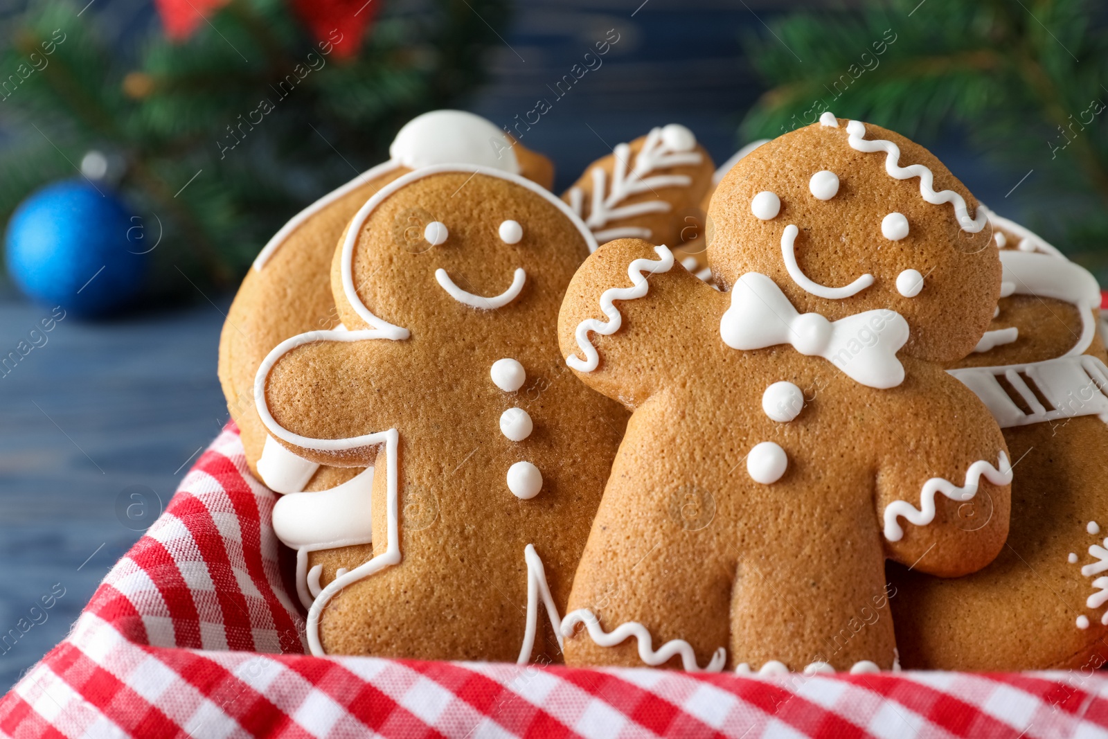 Photo of Decorated Christmas cookies in box, closeup view