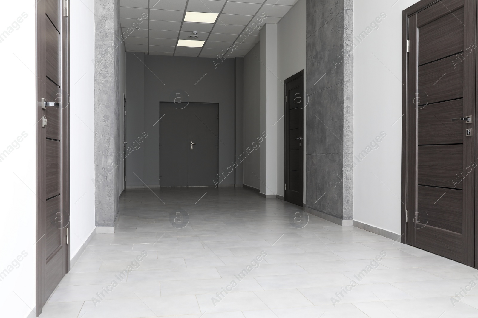 Photo of Empty office corridor with wooden doors, Interior design