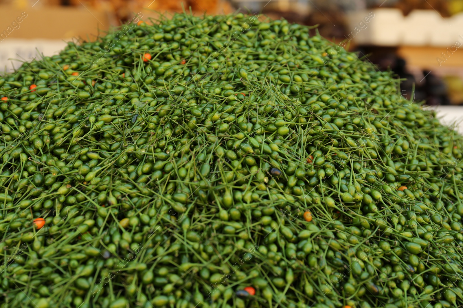 Photo of Heap of fresh delicious chiltepin at market