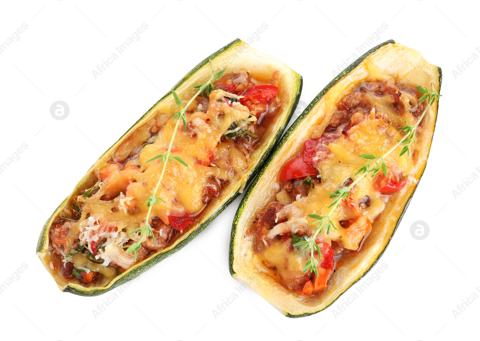 Photo of Delicious baked stuffed zucchini on white background, top view