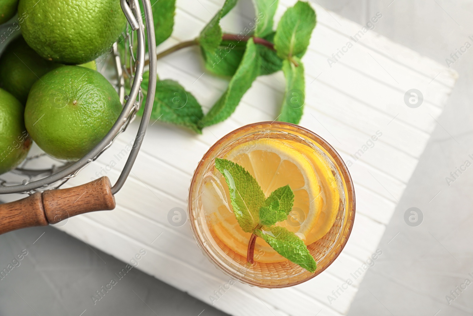 Photo of Flat lay composition with mint julep cocktail on table