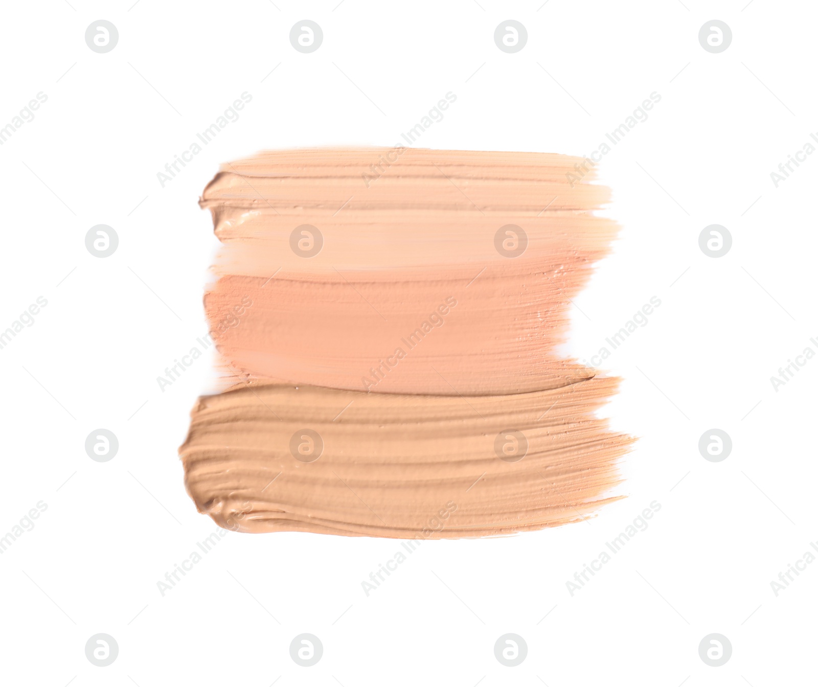 Photo of Samples of different foundation shades on white background, top view