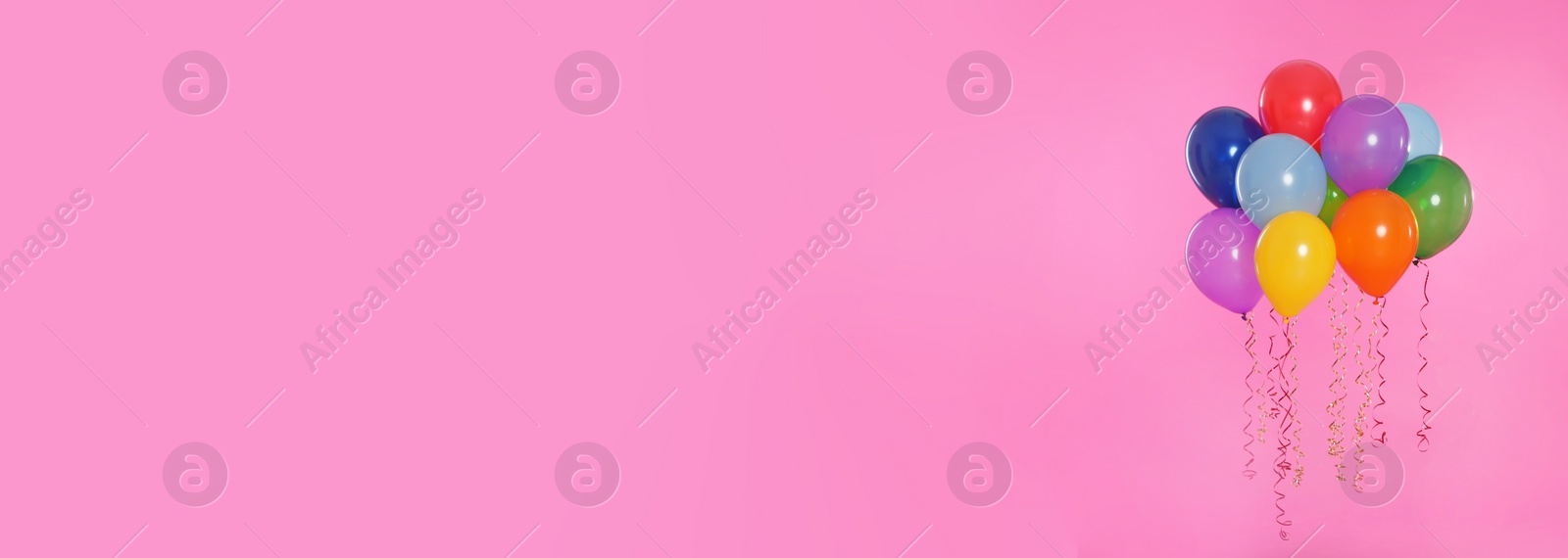 Image of Bright balloons on pink background, space for text. Banner design 