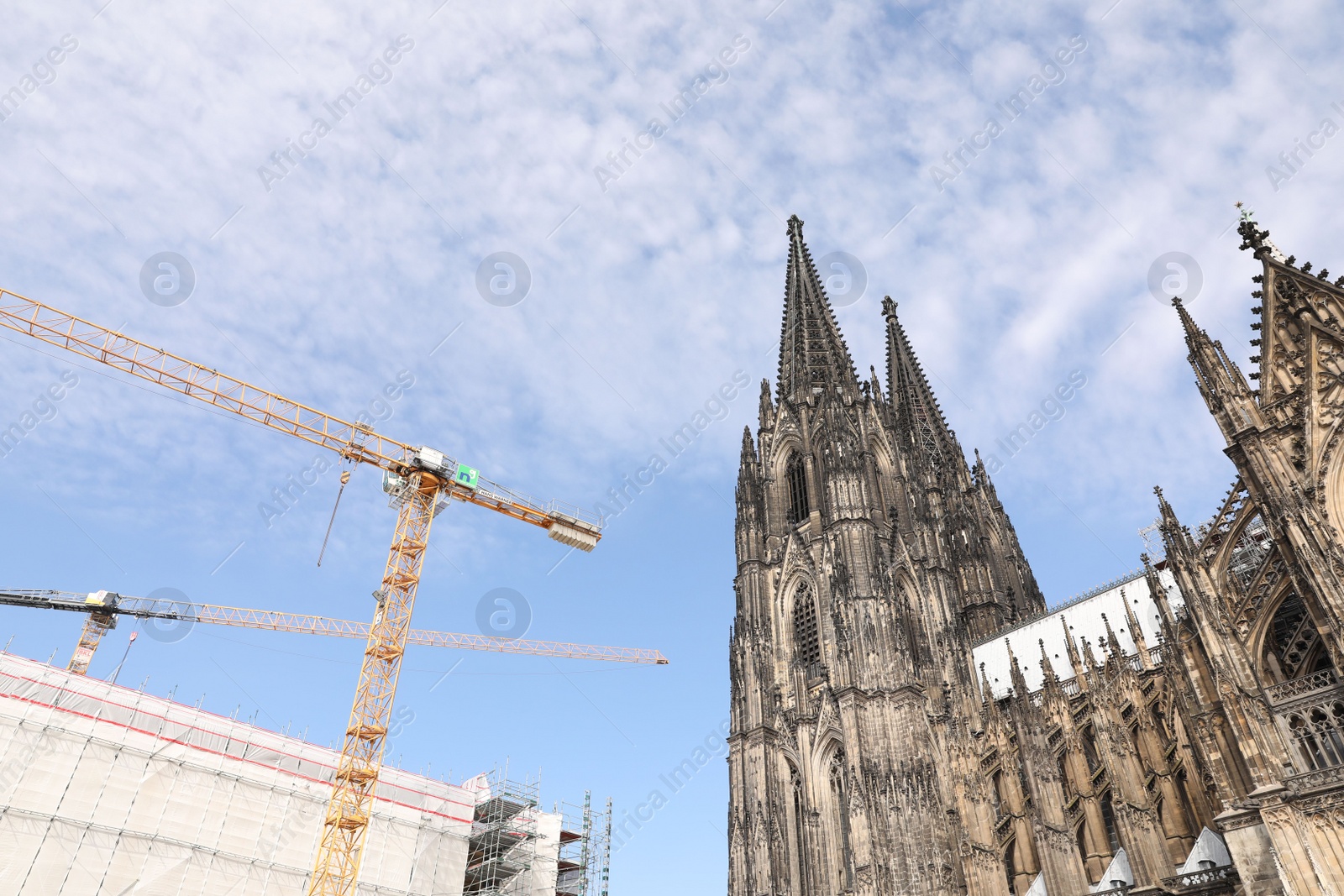 Photo of Cologne, Germany - August 28, 2022: Beautiful old gothic cathedral against blue sky