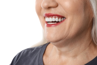 Smiling woman with perfect teeth on white background, closeup